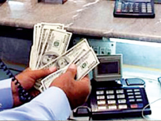 رئيس شعبة المستوردين : أزمة الدولار مؤامرة لإسقاط الدولة