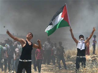 عباس: تأييد دولى لمبادرة السلام الفرنسية ونتانياهو يشكك فى حياد باريس