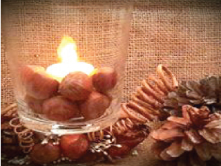 شموع البلح والمكسرات أناقة بروح الشهر الكريم