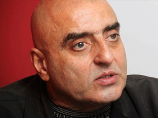 عزمى مجاهد مطالبا بـإغلاق الفيس بوك: «احرقوه بجاز»