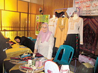 اللبس البدوى يحصد المركز الأول فى معرض المشغولات اليدوية للمرأة العربية بالمغرب