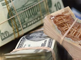 توقعات بانخفاض الدولار إلى 14 جنيهاً فى 10 أشهر