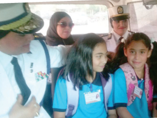 وفود مديرية أمن القاهرة تصطحب أبناء الشهداء للمدارس