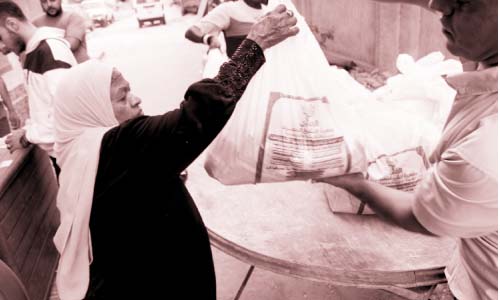 توزيع شنط رمضان على 400 ألف أسرة من الأوقاف والتموين