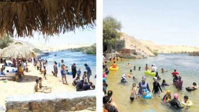أهالى أسوان يهربون من «الحر»  إلى  شواطئ الغلابة فى «النيل»
