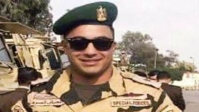 والدة البطل خالد المغربى: ابنى استشهد وفى حضنه «المصحف».. وكان ينادينى بـ«أم الشهيد»